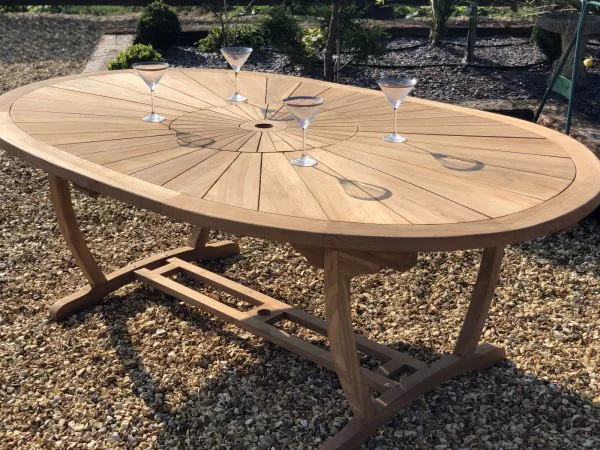 oval teak table