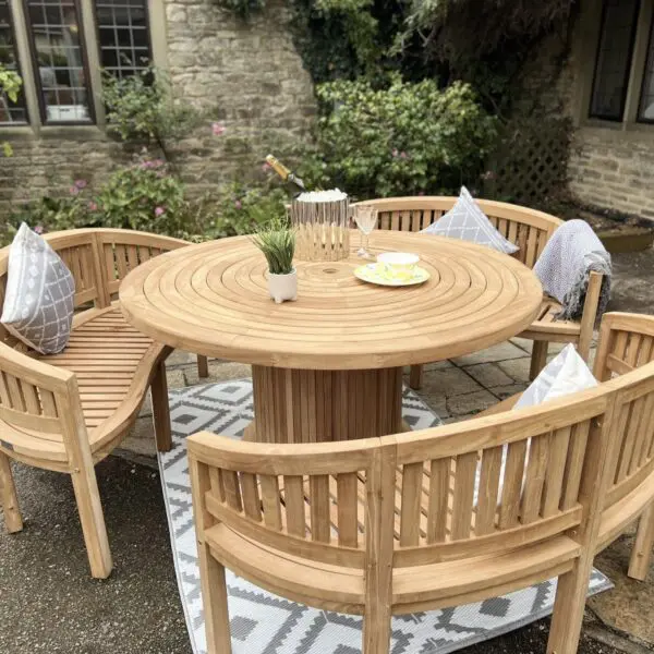 Teak Garden Furniture Round Table 180cm with 3 Bowood Benches Teak round table with a 80cm Lazy Susan In The Centre of The Table