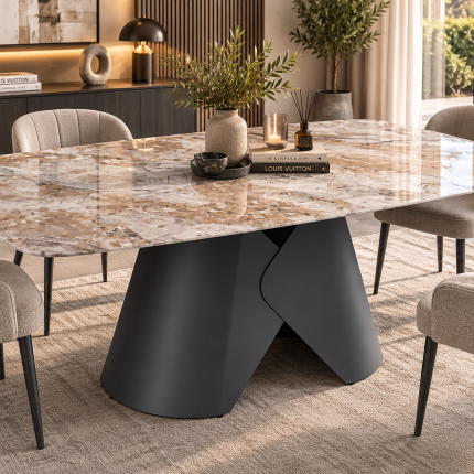 Large beige and cream marble effect ceramic dining table with rounded corners and black sculptural pedestal base