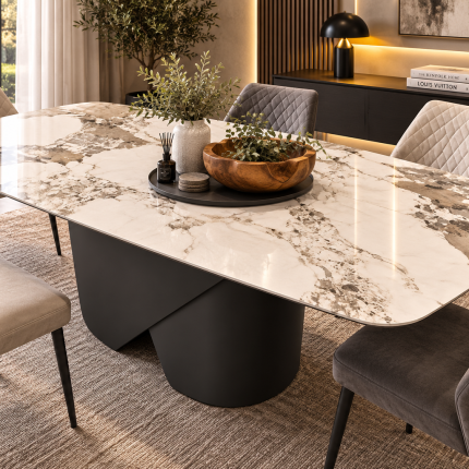 Large white and grey marble effect ceramic dining table with rounded corners and black sculptural pedestal base