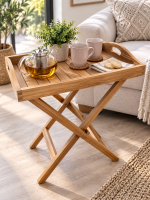 Solid teak folding tray table with removable serving tray top and crossed wooden legs